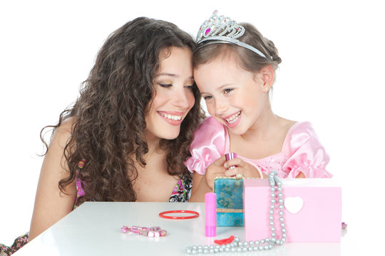 picture of happy mother and little girl dressed as princess