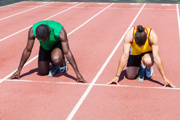 Two Track and Field Athletes before the Race Start