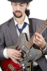 Fototapeta na wymiar Guitar player in business suit on white