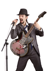 Businessman playing the guitar on white