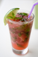 strawberry mojito cocktail with lime