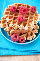 Close-up of waffles with raspberries