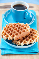 Vertical shot of delicious waffles and coffee