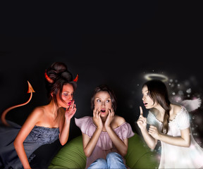 Portrait of pretty woman sitting at home. Angel and devil talkin