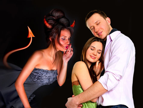 Young couple embracing in love. Devil whispering wrong things to