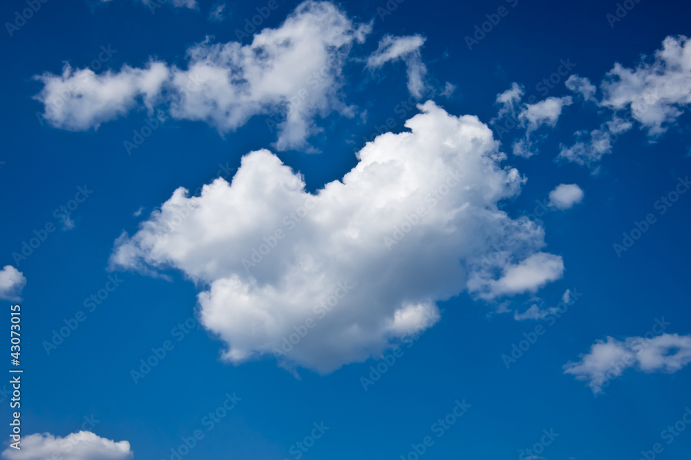 Wall mural single cloud in blue sky