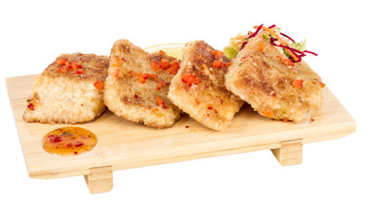 Fried fish fillets with  salad.