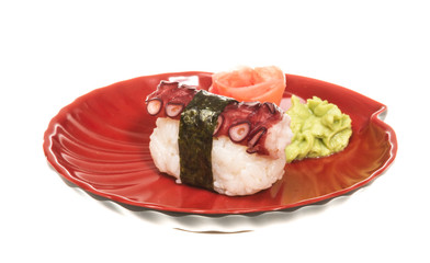 Japanese sushi with meat octopus on a white background