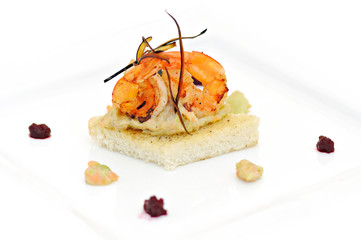 healthy meal with cooked shrimps, bread and vegetables