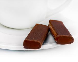 Chocolate cookies near a coffee cup