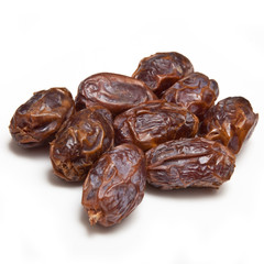 Medjool dates isolated on a white studio background.