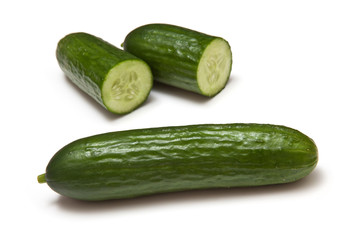 Mini Cucumbers isolated on a white studio background.