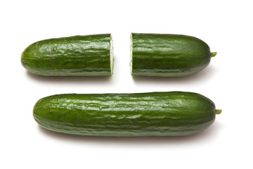 Mini Cucumbers isolated on a white studio background.