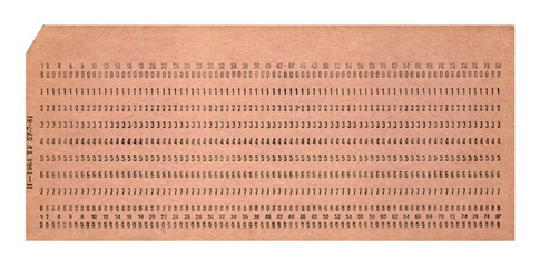 vintage punched card isolated on white background, retro technology, analog data cardboard with numerics heap closeup