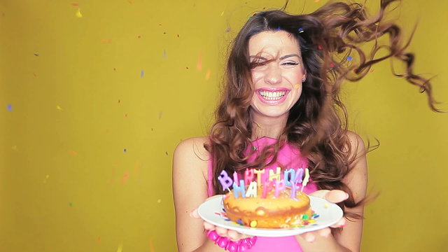 Birthday girl with her cake