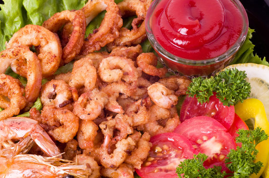 Tasty deep fried squid rings and fried prawn