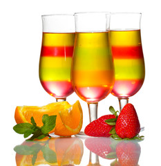 fruit jelly in glasses and fruits isolated on white