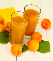 glasses of apricot juice  and fresh apricots