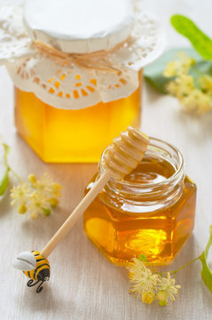 Two Jars Of Linden Honey And Spoon Of Honey