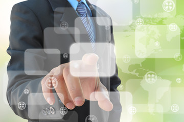 businessman hand pushing button