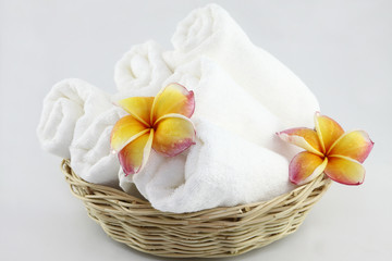 Frangipani flowers and Towel for spa
