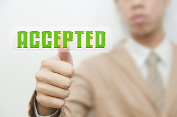 Business man pressing touch screen on accepted button