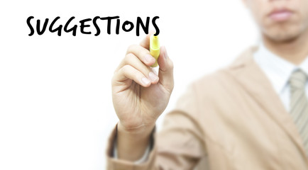 Young business man writing suggestion word, isolated over white