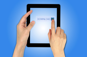 a male hand holding a touch screen device and pressing on downlo