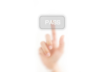 man finger pressing a touchscreen on pass button