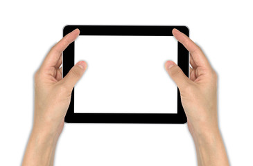 a male hand holding a touchpad