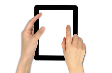 a male hand holding a touchpad