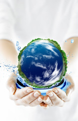 Hands and Earth. Symbol of environmental protection