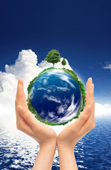 Hands and Earth. Symbol of environmental protection