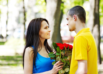 Couple of teenager on date outdoor.