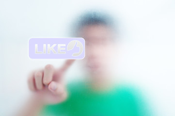 man pressing a touchscreen like button