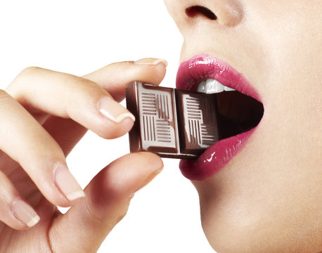 Woman With Pink Lips Biting Chocolate Bar Detail