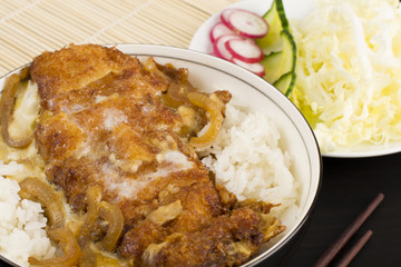 Katsudon -Breaded fried pork cutlet, onion & egg on steamed rice