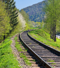 Railway disappears in the mountains