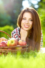 fruits  in the basket with his wife. vitamins from your own gard