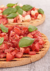 bruschetta with tomato, mozzarella and basil