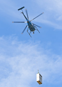 Helicopter carrying a load
