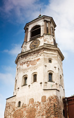 Fototapeta na wymiar Medieval clock tower in Vyborg