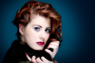 Fototapeta premium Beaytuful young female with retro look and makeup