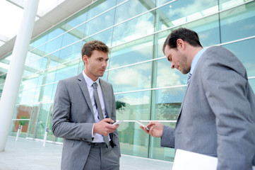 Business people looking for a meeting date