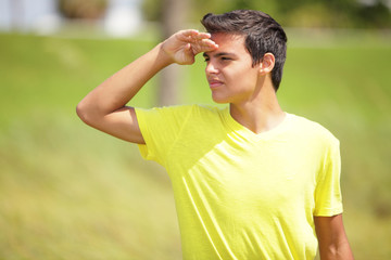 Stock image of a young man on the lookout
