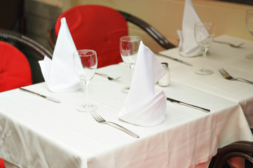 Prepared for visitors typical table with red reflection