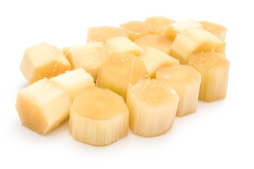 small pieces of sugarcane on white