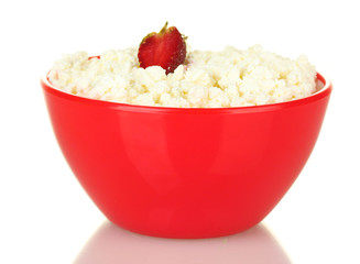 cottage cheese in red bowl with strawberry isolated on white