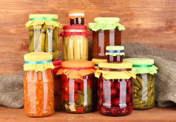 Jars with canned vegetables and fruit