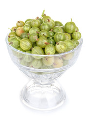 Green gooseberry in glass isolated on white